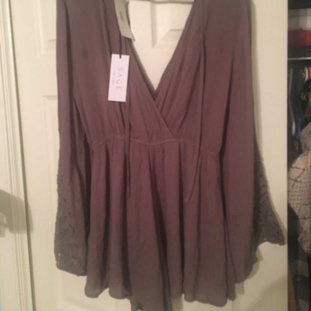 Long sleeve romper. Never worn. NWT